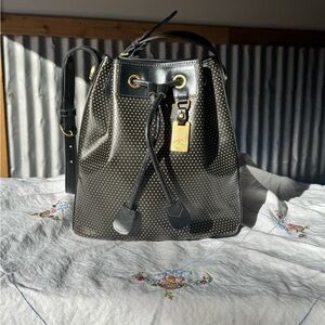 Vintage Dooney & Bourke perforated leather drawstring bucket bag